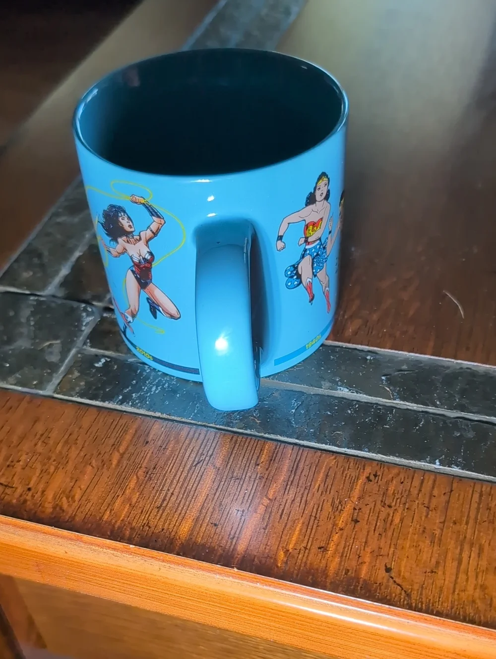 Blue Wonder Woman Through The YearsGraphic Mug The Unemployed Philosophers Guild